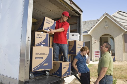 A well-organised flat move setup in Beckton with boxes and furniture