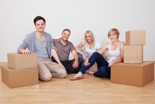 Commercial relocation team moving office equipment in Beckton