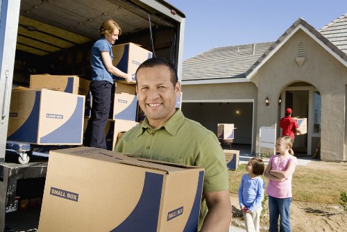 Careful loading of furniture and boxes for a house removal in Beckton